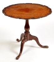 Lot 1284 - A George III mahogany tip-up-top occasional...