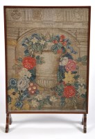 Lot 1288 - A 19th Century needlework firescreen,...