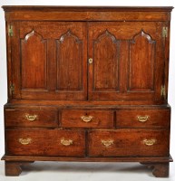 Lot 1294 - An 18th Century oak cupboard-on-chest, the...