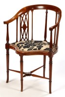 Lot 1312 - An Edwardian inlaid mahogany salon chair, the...