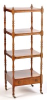 Lot 1317 - A 19th Century rosewood four-tier whatnot, the...