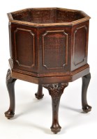 Lot 1322 - A George III style mahogany octagonal wine...