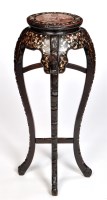 Lot 1323 - A 20th Century Chinese carved hardwood...