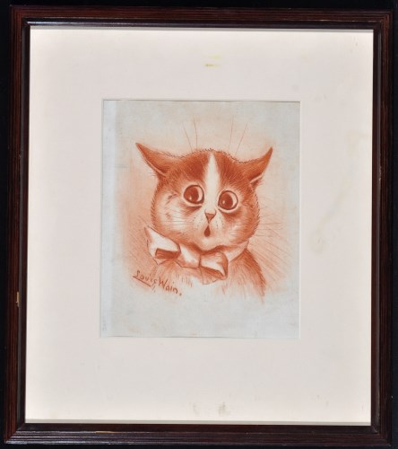 Lot 187 - Louis Wain (1860-1939) A surprised cat in bow...