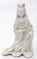 Lot 535 - Chinese Dehua figure of Guanyin, seated with...