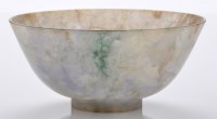 Lot 590 - Mottled pale 'lavender' jade bowl, the...