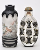 Lot 601 - Chinese overlay glass snuff bottle, black...