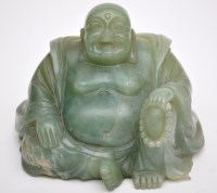 Lot 614 - Chinese bowenite carving of a seated Buddha,...