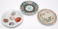 Lot 634 - Three Japanese dishes, one painted in the...