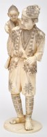 Lot 643 - Carved Japanese part ivory figure of a man...