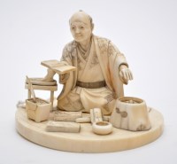 Lot 644 - Japanese part ivory okimono of a scholar,...