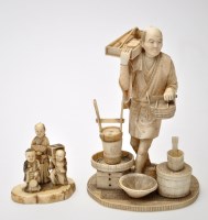 Lot 645 - Japanese carved part ivory figure of a pail...