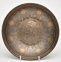 Lot 648 - Silver metal inlaid brass dish of 'Islamic'...