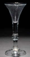 Lot 658 - Drawn trumpet baluster wine glass of the...