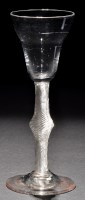 Lot 662 - Pan topped wine glass, raised on a...