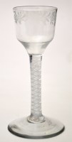 Lot 663 - Engraved opaque twist wine glass, ogee bowl...