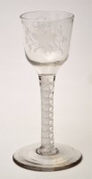 Lot 664 - Engraved opaque twist wine glass, ogee bowl...