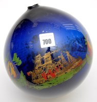 Lot 700 - A coloured printed blue glass sphere of 'North...