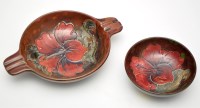 Lot 722 - Moorcroft 'Hibiscus' pattern bowl and ashtray,...