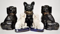 Lot 747 - Pair of Saddler black glaze 'Wally Dugs', with...