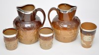 Lot 748 - Two silver mounted salt glaze stoneware jugs...