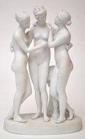 Lot 790 - Biscuit figure of the 'Three Graces', nude,...