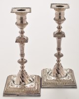 Lot 802 - A pair of candlesticks in the mid 18th Century...