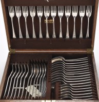 Lot 822 - A George V flatware and cutlery service, by...