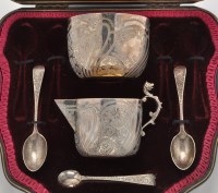 Lot 862 - A Victorian cased sugar bowl, cream jug,...