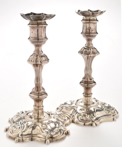 Lot 864 - A Pair of George II candlesticks, by Phillips...