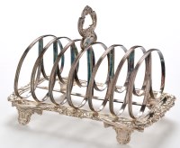 Lot 866 - A William IV seven bar toast rack, probably by...