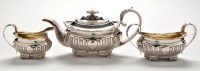 Lot 875 - A George III three piece tea service, by...