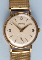 Lot 919 - Garrard: a 1950's gentleman's 9ct. gold...