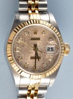 Lot 933 - Rolex Datejust: a steel and gold wristwatch,...