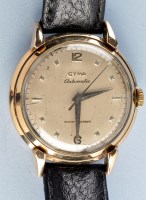 Lot 936 - Cyma Automatic: a gentleman's 1950's 9ct. gold...