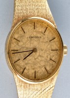 Lot 942 - Longines: a 1970's lady's 18ct. bracelet watch,...