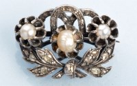 Lot 949 - A late 19th Century diamond and pearl brooch,...