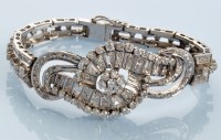 Lot 961 - A diamond bracelet, set throughout with...