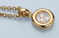 Lot 971 - Chopard, Geneve: a happy diamonds pendant, set...