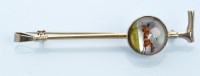 Lot 976 - A yellow and white metal riding crop pattern...