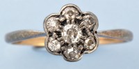 Lot 993 - A diamond cluster ring, the flowerhead cluster...