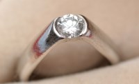 Lot 1014 - A single stone brilliant-cut diamond ring,...