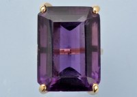 Lot 1020 - An amethyst ring, the emerald-cut amethyst...