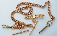 Lot 1026 - A 9ct. yellow gold watch chain, fitted clasp...