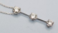 Lot 1038 - A diamond drop pendant necklace, the graduated...