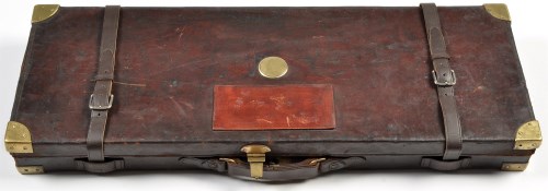 Lot 1065 - A leather on wood car case for a pair of 12...
