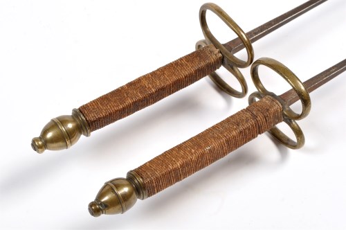 Lot 1072 - Two epee swords, each of the tipped graduated...