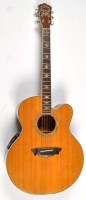 Lot 1125 - A Washburn Cumberland Electro-Acoustic Guitar,...