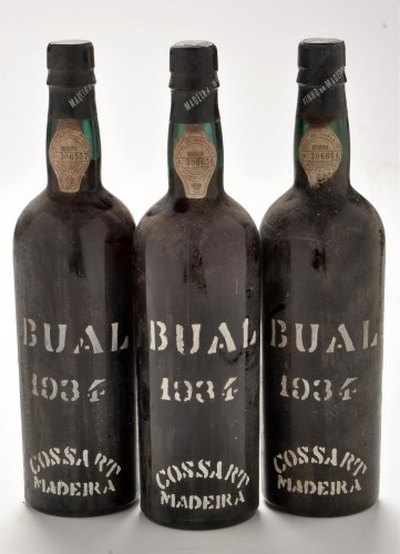 Lot 1144 - Three bottles of Cossart Maderia Bual 1934.