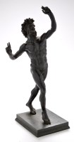 Lot 1206 - A patinated bronze model of a satyr, after the...